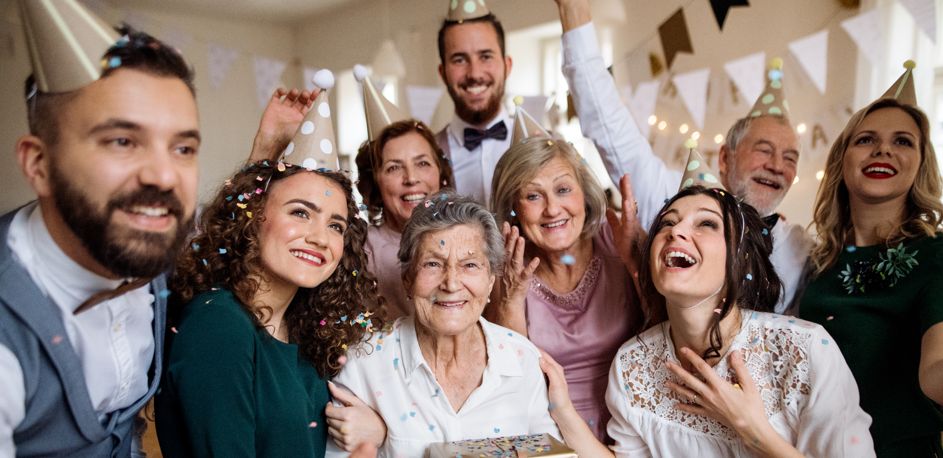 Friends celebrating together at a large Cotswold holiday home